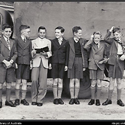 Seven boys stand beside a covered truck at Kilmany Park Boys Home, Sale, Victoria